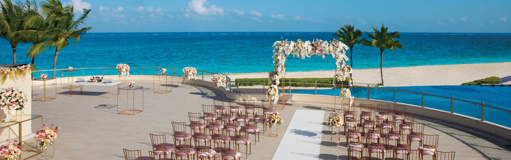 Why is dreams riviera cancun resort a great budget friendly option for an all-inclusive destination wedding 