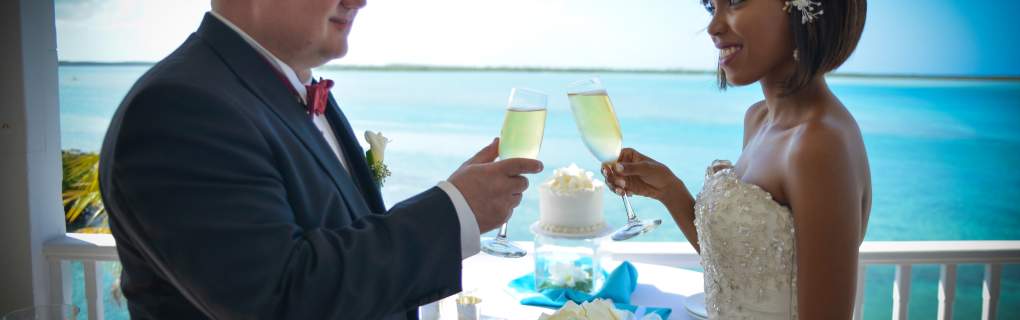 For a us-based couple interested in a destination wedding, why should they focus on all-inclusive resorts in Mexico, the Caribbean, Central America and beyond, and why should they use a travel agent for this 