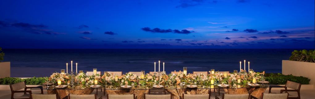 For a us-based couple interested in a destination wedding, why should they focus on all-inclusive resorts in Mexico, the Caribbean, Central America and beyond, and why should they use a travel agent for this 