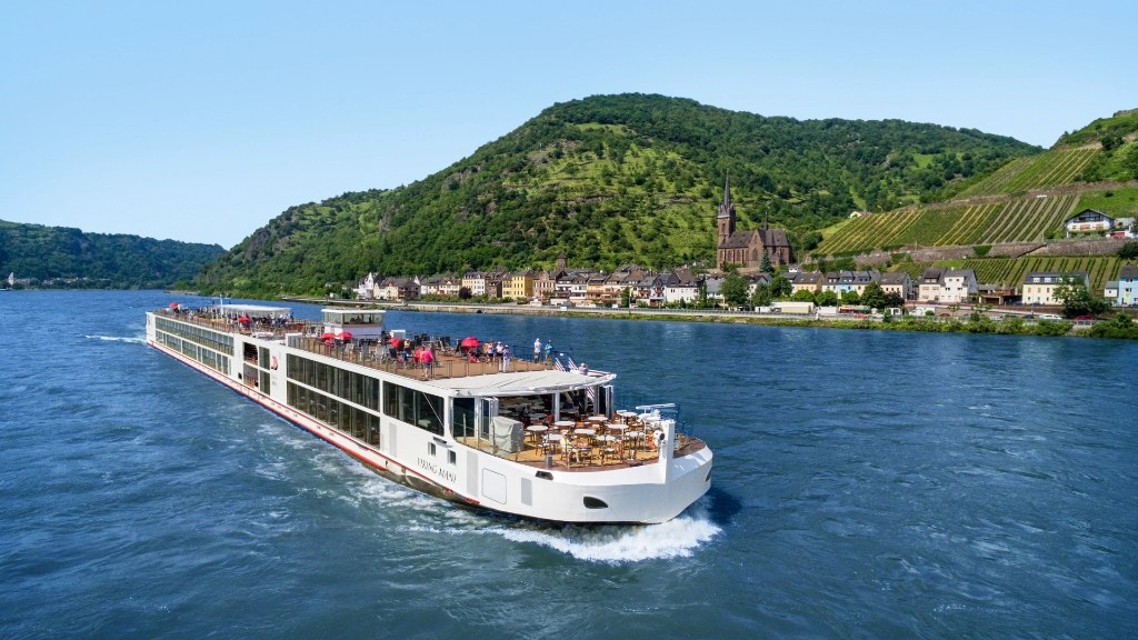 Viking Mani Longship sailing past vineyards with outdoor Aquavit Terrace dining
