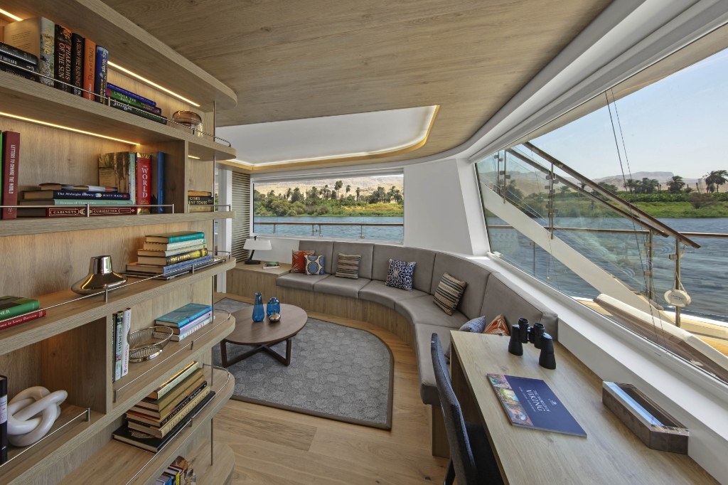 Viking Longship panoramic observation lounge and Scandinavian library overlooking the river