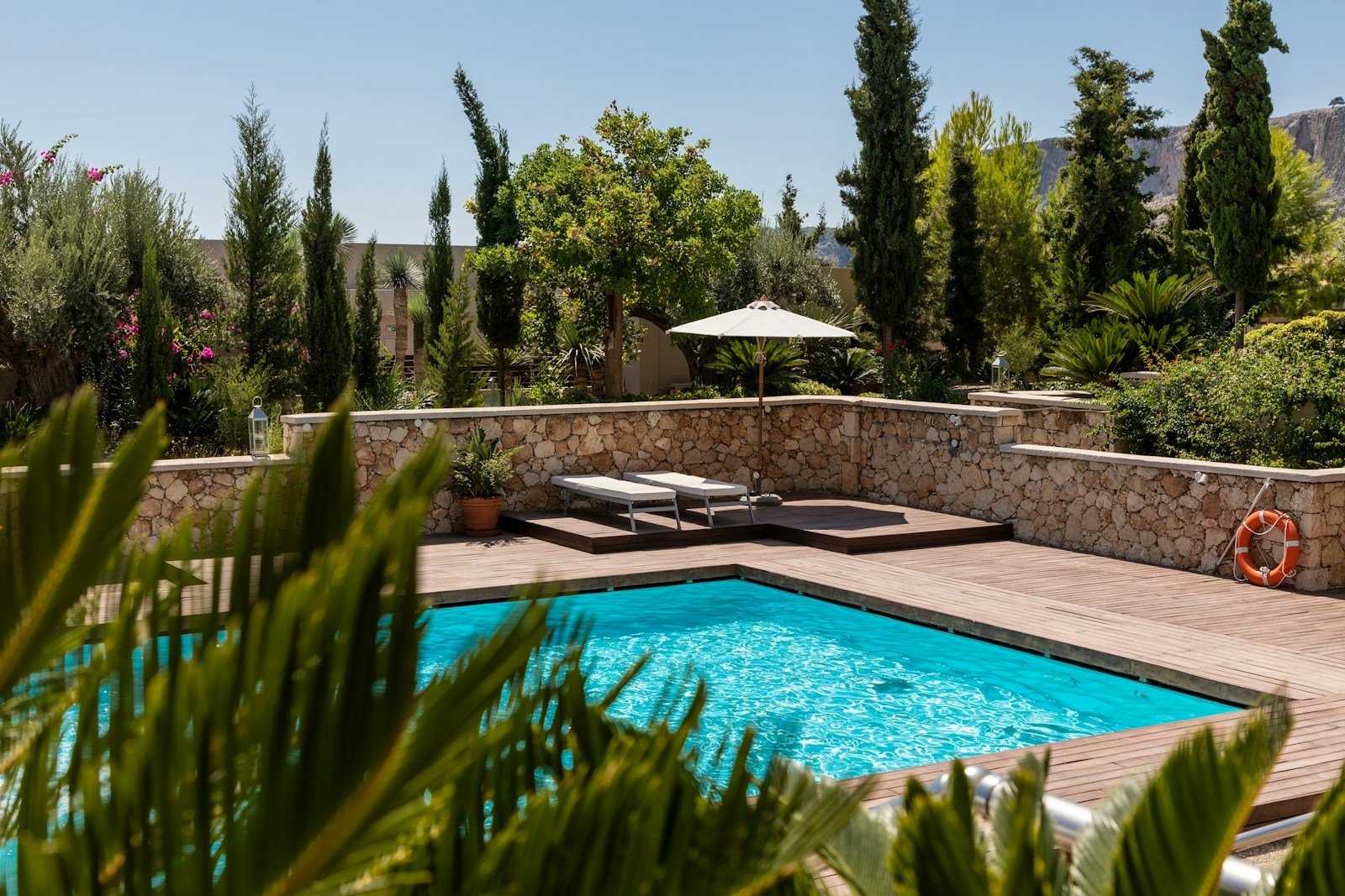 Amadeus top sun deck with heated swimming pool, giant chess board, and sun loungers