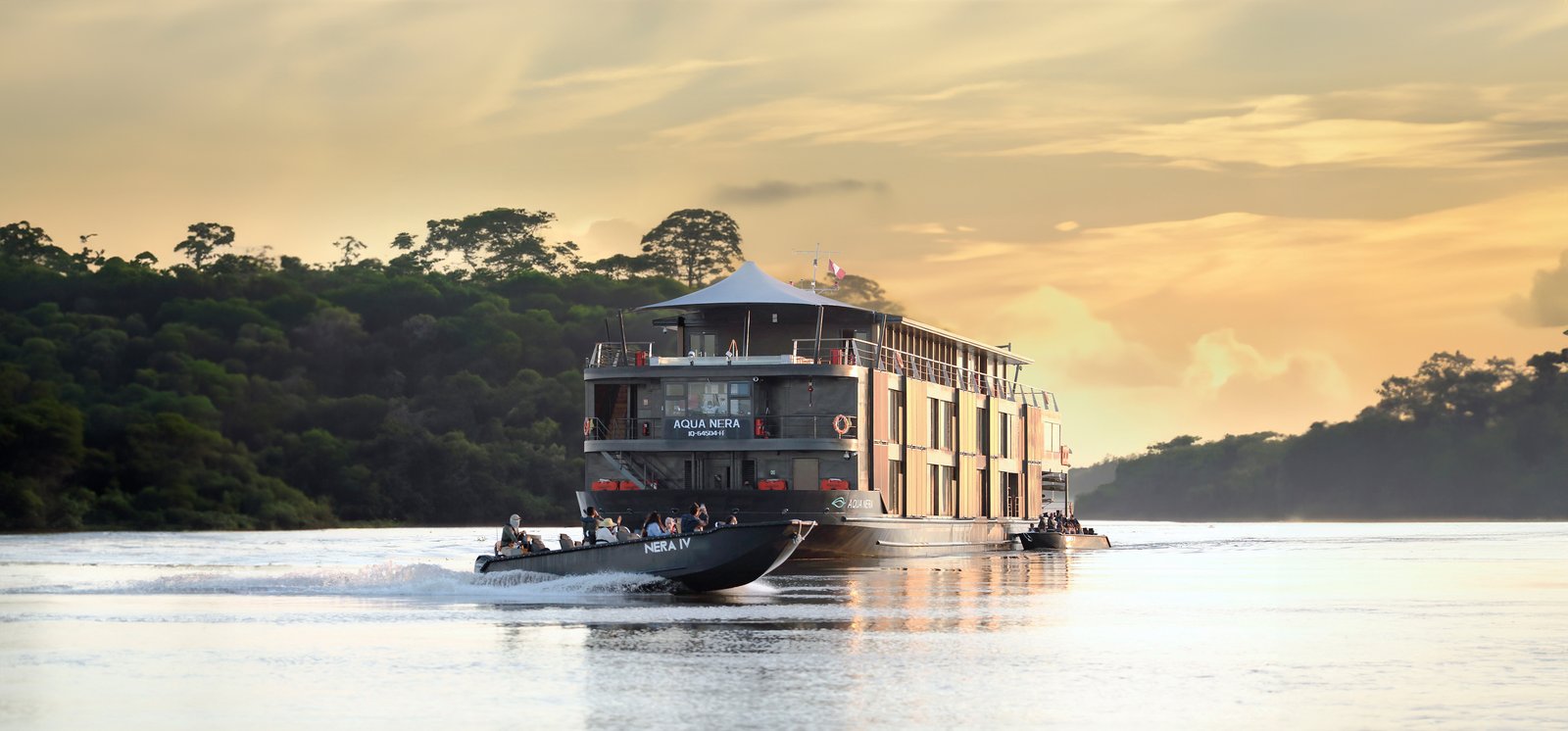 Aqua Expeditions Aqua Nera luxury boutique expedition vessel navigating the blackwaters of the Peruvian Amazon