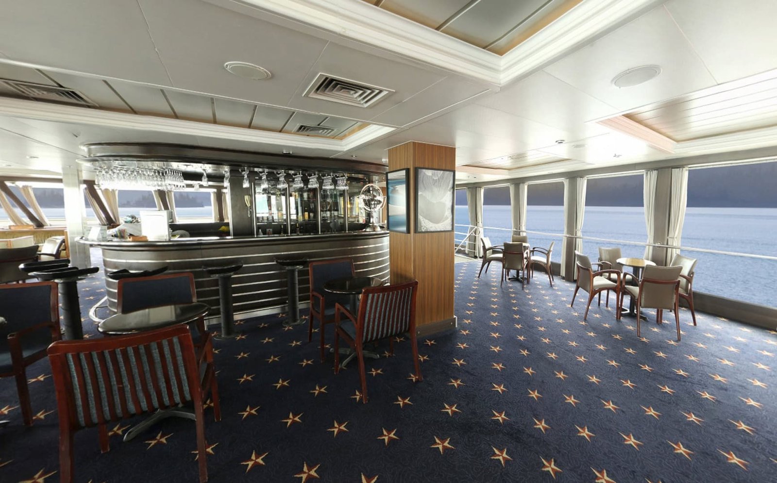 Darwin Lounge aboard Australis Cruises during a multimedia presentation by onboard glaciologists