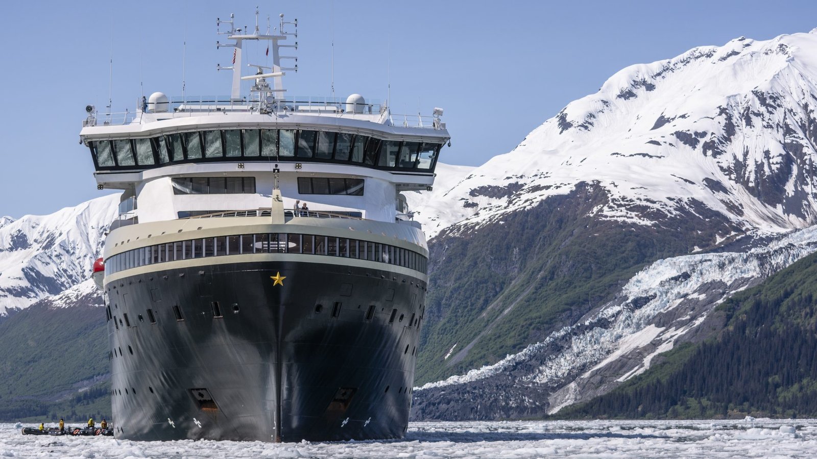 HX MS Roald Amundsen battery hybrid expedition cruise ship sailing near glaciers