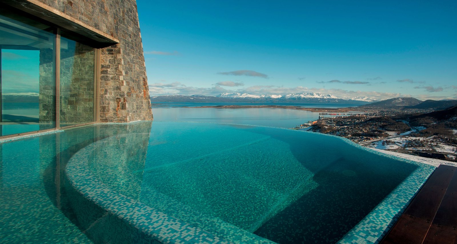 Outdoor heated whirlpool spas overlooking polar icebergs and mountains