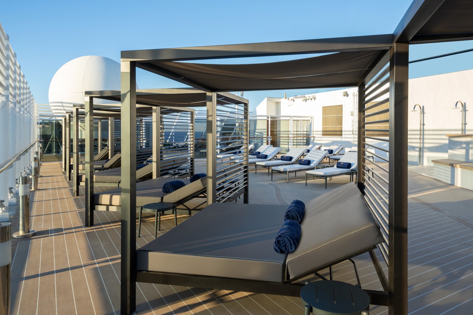 MSC Yacht Club private top-deck solarium with exclusive swimming pool and whirlpools