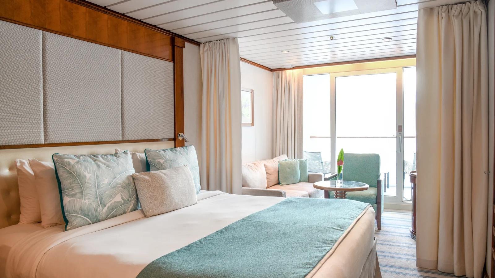 Category B Veranda Stateroom on Deck 8 with queen bed and private balcony