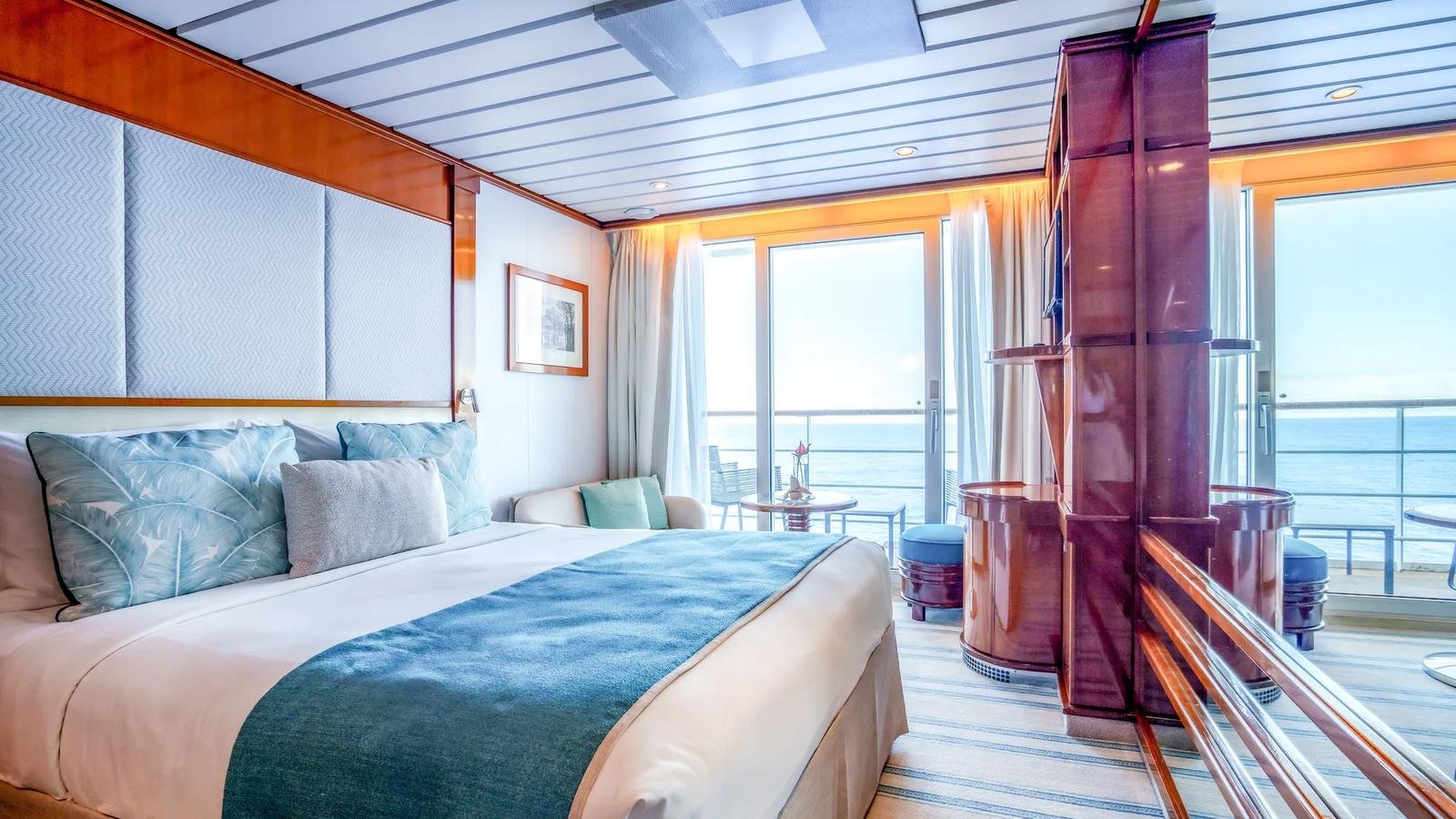 Category C Balcony Stateroom with teak veranda on Deck 7