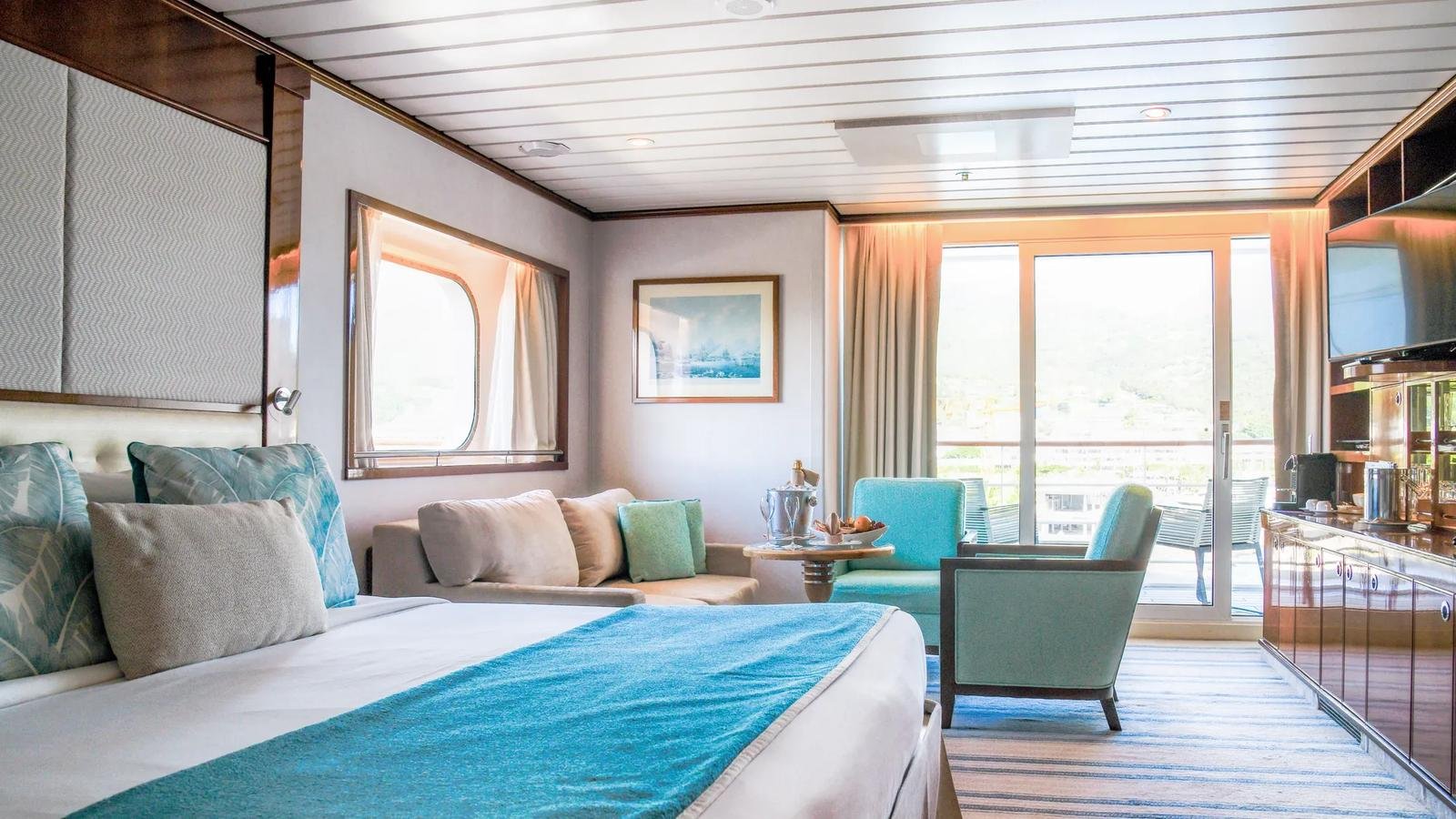 Luxury bathroom with full-size soaking bathtub in the Grand Suite aboard Paul Gauguin