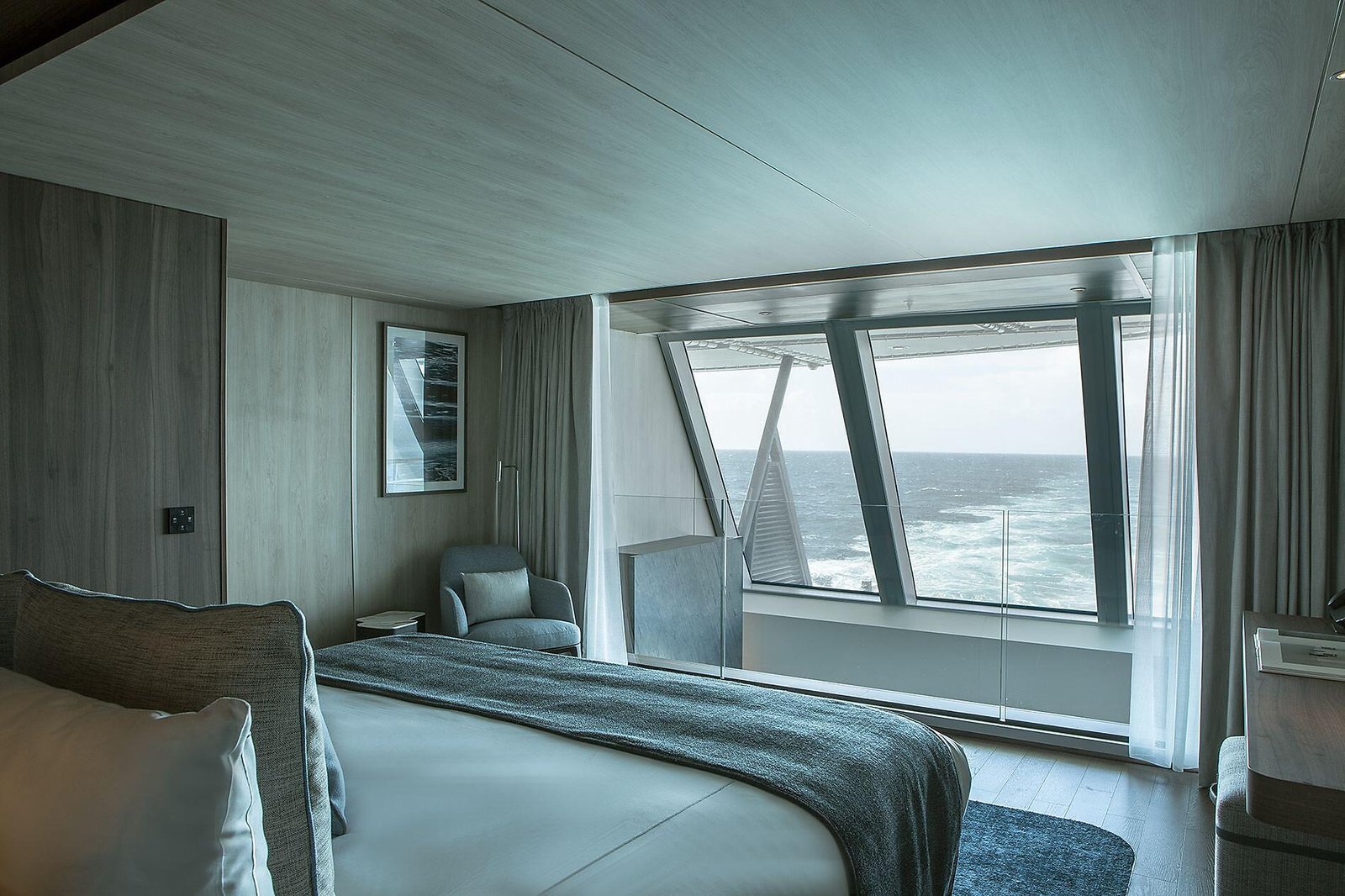 Two-level Duplex Suite living room and outdoor terrace jacuzzi aboard Le Commandant Charcot
