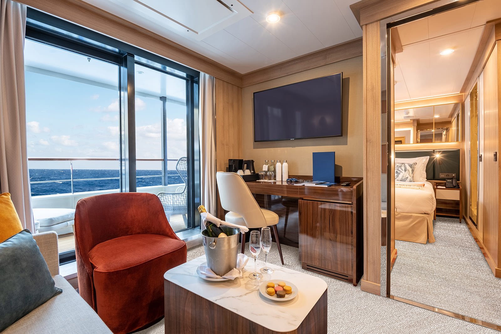World Explorer Owner Suite living room and private dining table