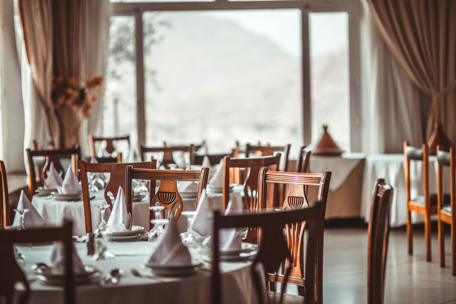 Lumiere French fine dining restaurant aboard Scenic Eclipse with elegant place settings