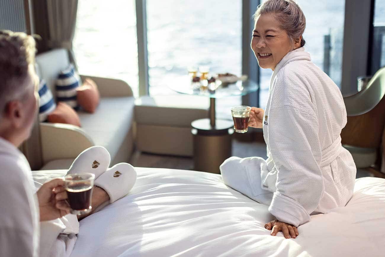 Relaxing morning in Seabourn suite lounge with plush robes and Nespresso