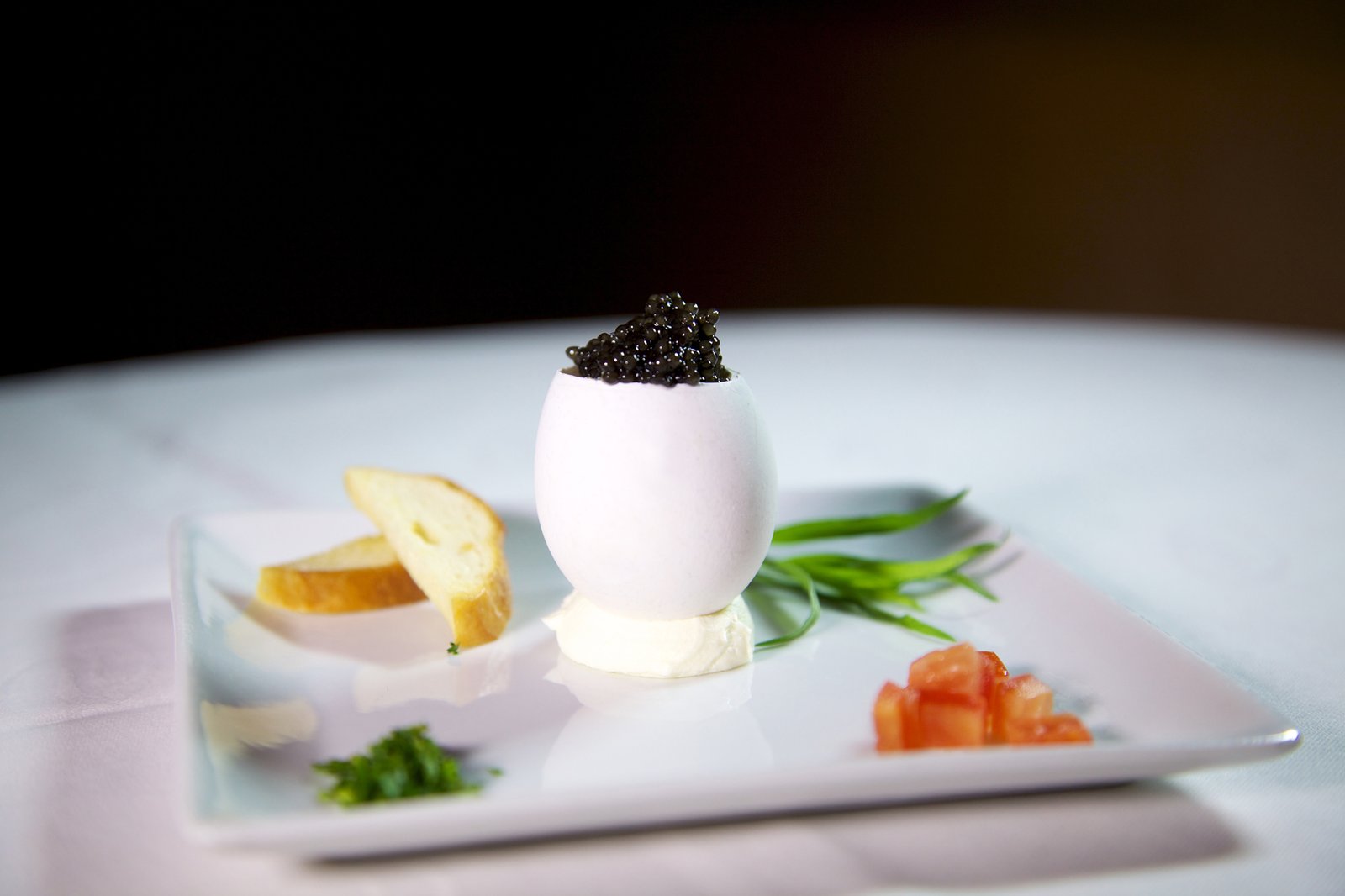 Gourmet culinary presentation of Roeuf Poule Au Caviar Surprise served aboard SeaDream