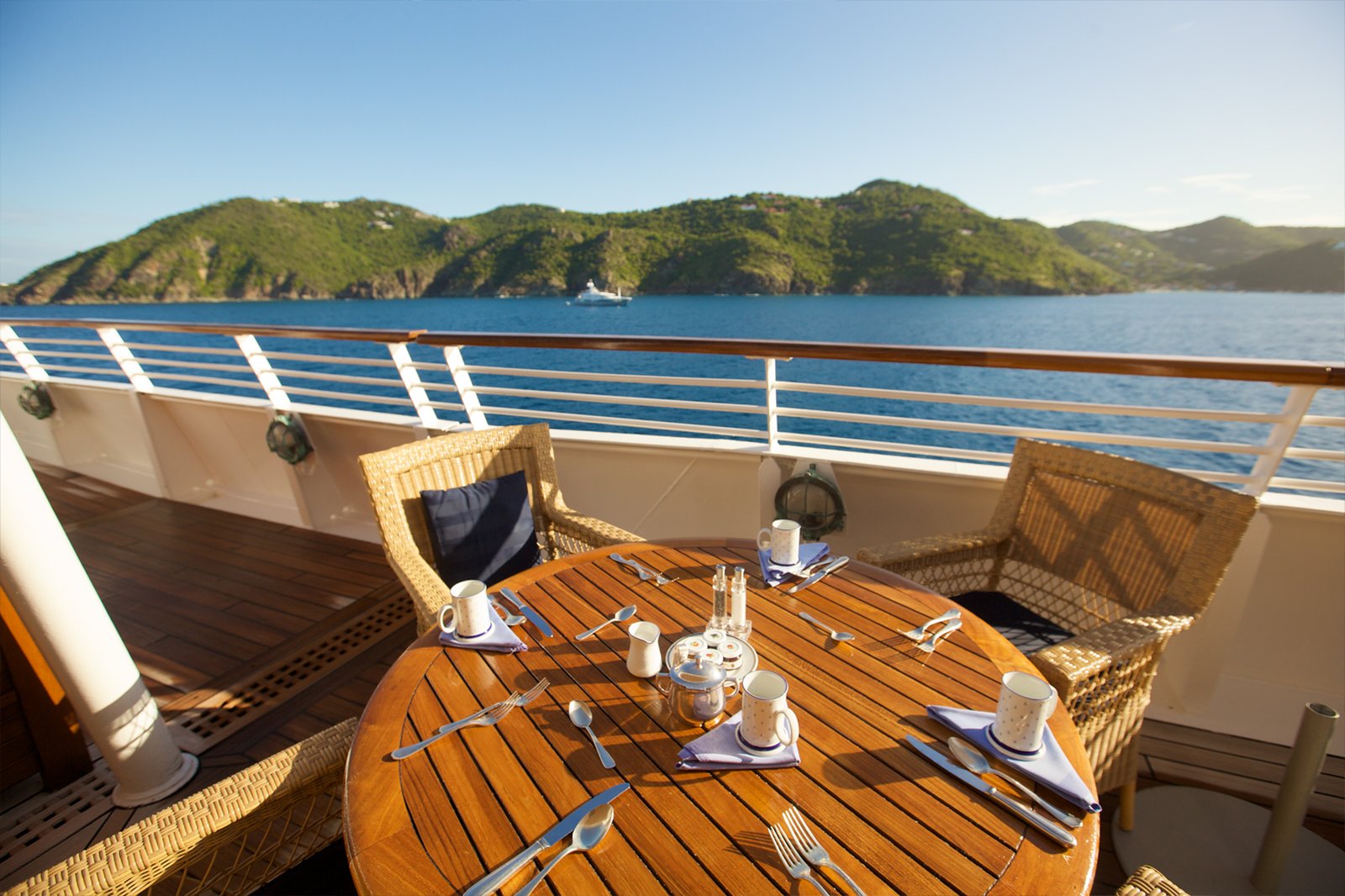 Topside Restaurant alfresco gourmet dining on the open teak deck with panoramic sea views