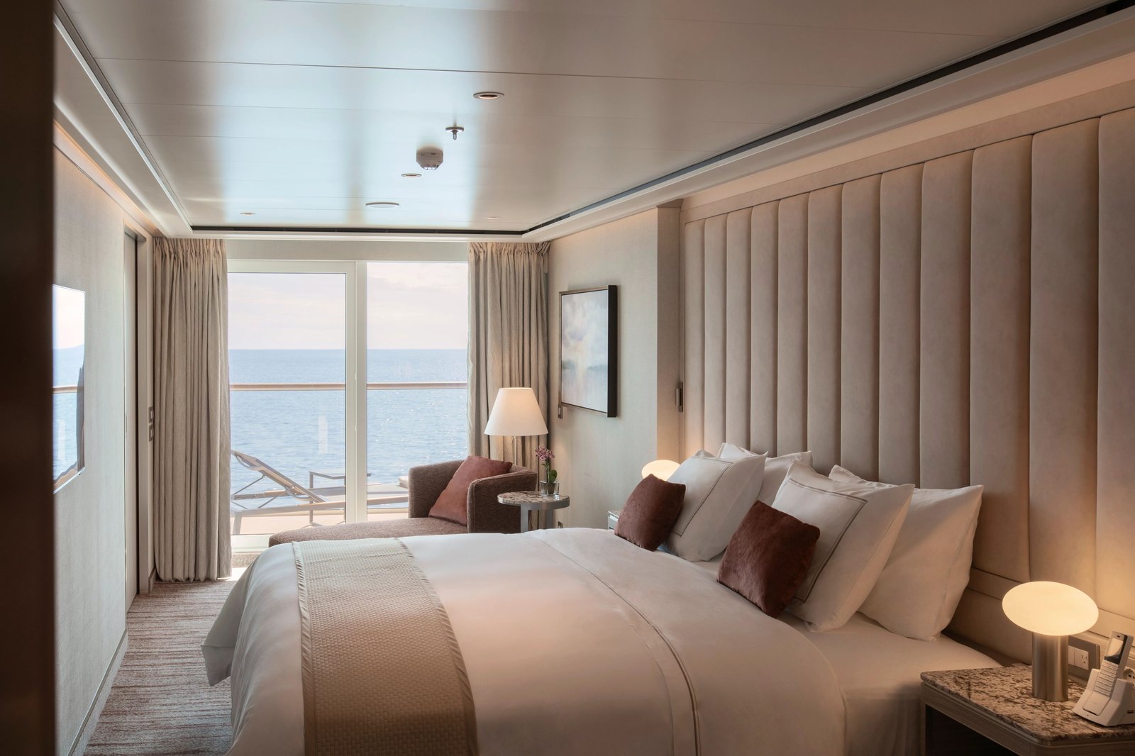 Expansive living room and formal dining salon inside the Silversea Owner's Suite