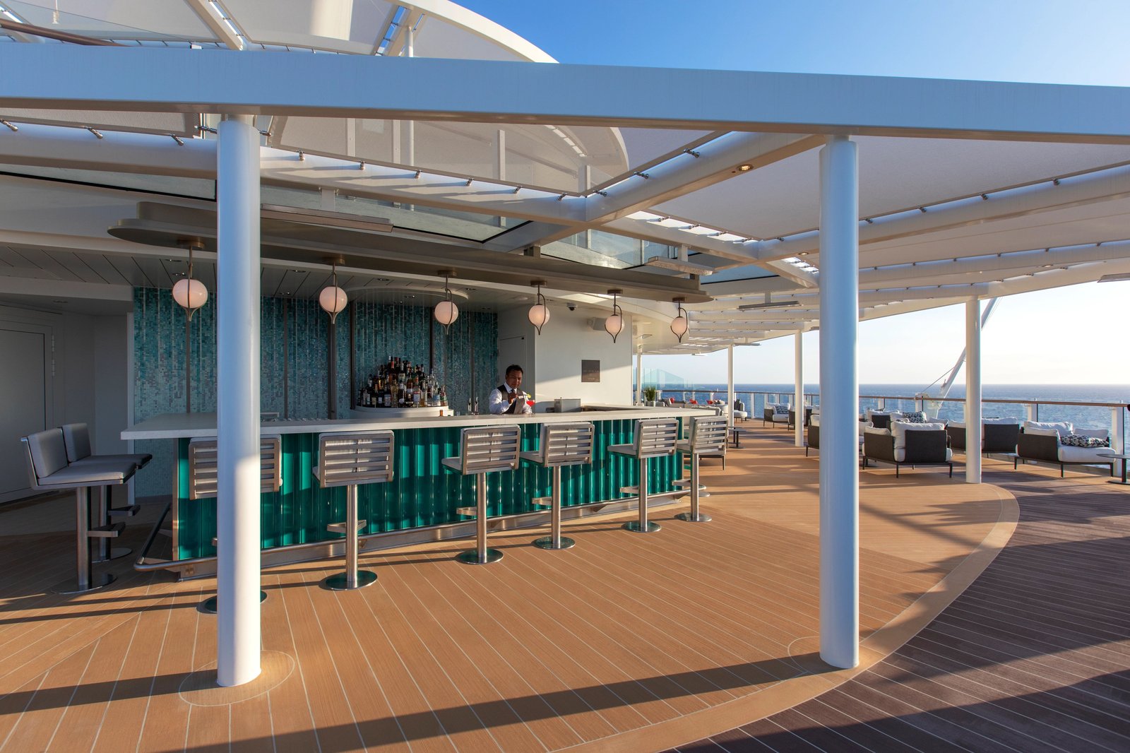 Panoramic observation lounge aboard Silver Nova with floor-to-ceiling ocean vistas