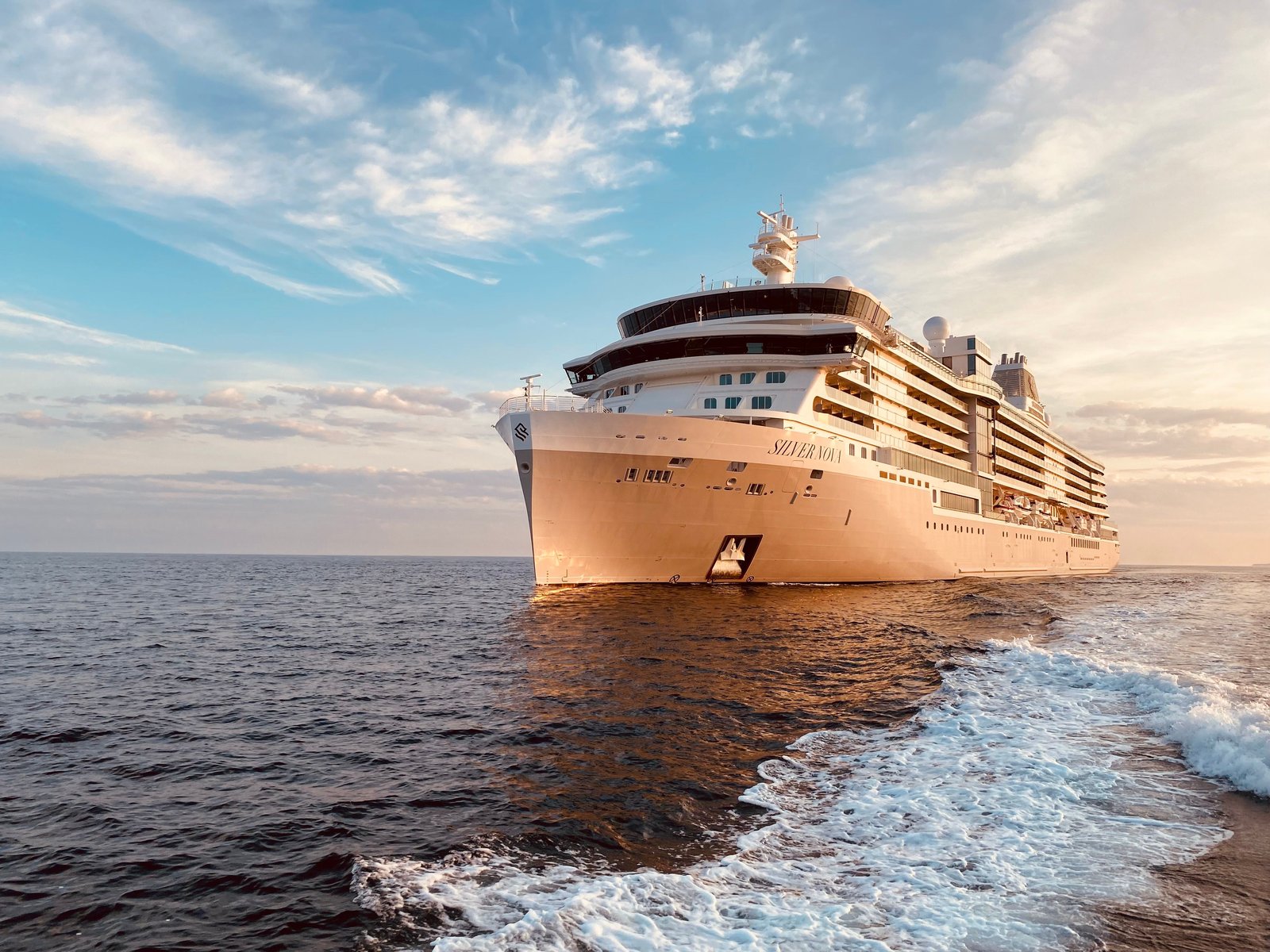 Silversea Silver Nova docked in port showing the ship's sleek architectural exterior profile