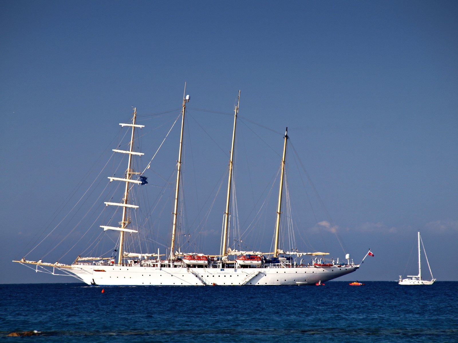 Star Flyer anchored off the historic citadel of Calvi in Corsica