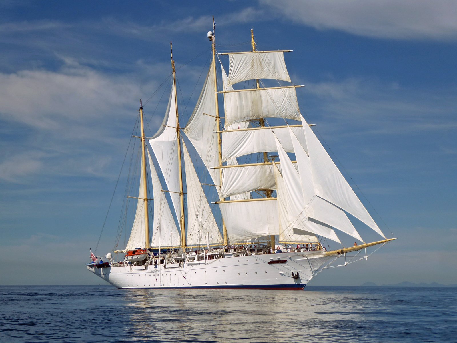 Star Flyer berthed in Port Hercule Monaco alongside modern super-yachts