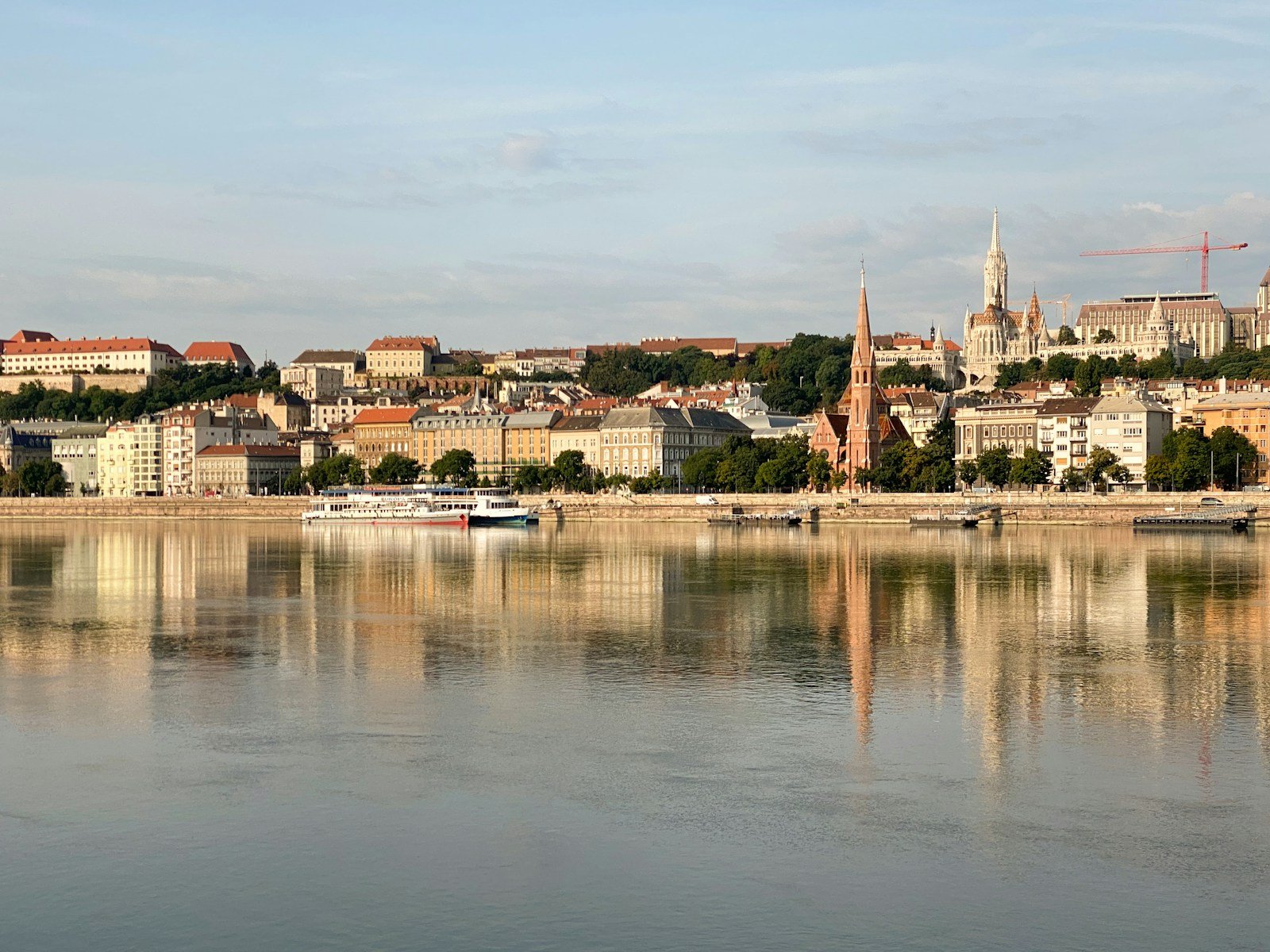 Historic European river port with cruise ship docked in Passau along the Danube River