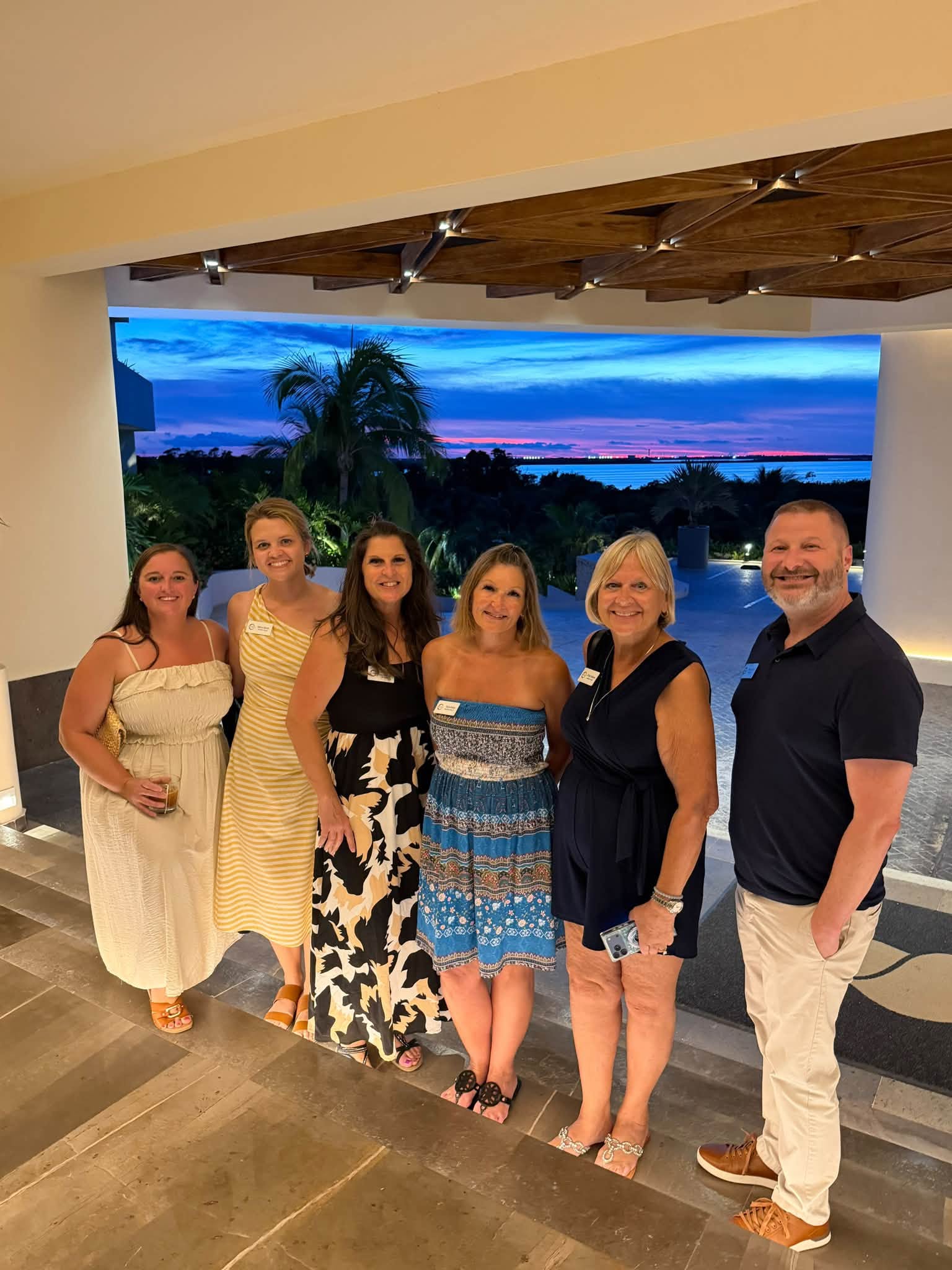Vincent Vacations advisors networking during sunset at Secrets Mirabel Cancun