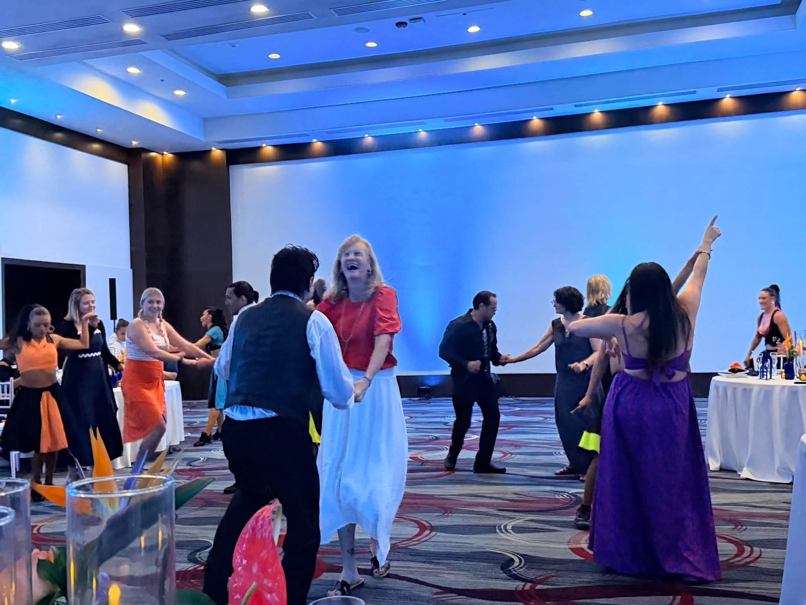 Jill LaBarre and Travel Agent Pro advisors enjoying Latin dancing during the farewell gala celebration