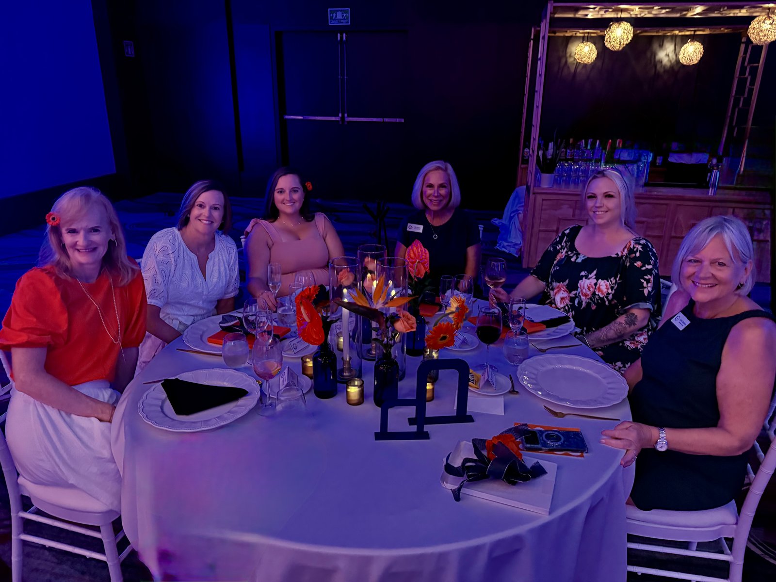 Travel Agent Pro attendees smiling together at the farewell gala dinner celebration