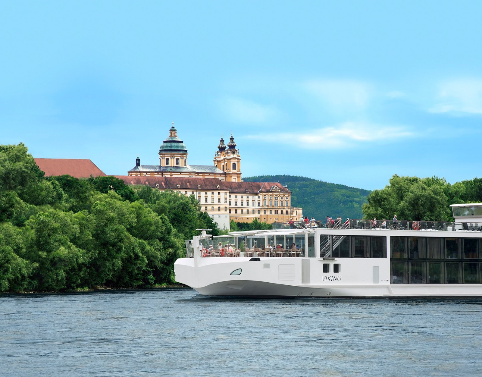 Viking Longship cruising the Danube River past historic European castles and vineyards