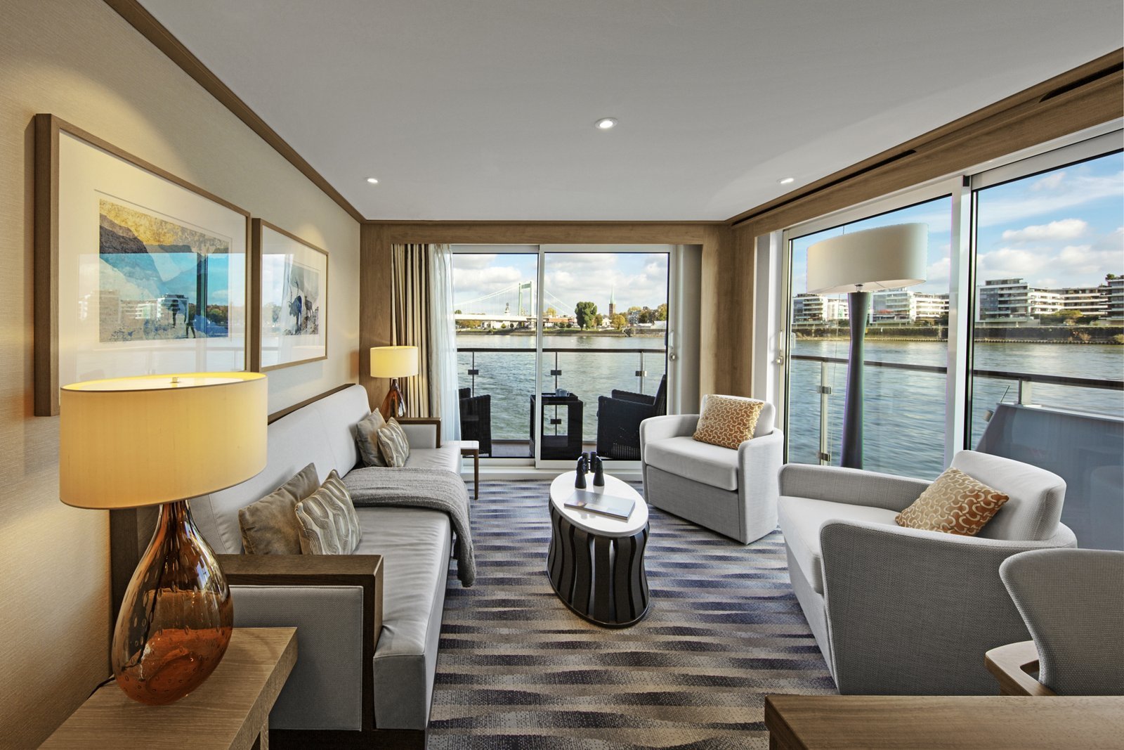 Viking Longship Explorer Suite with 270-degree wraparound aft balcony and luxury living room