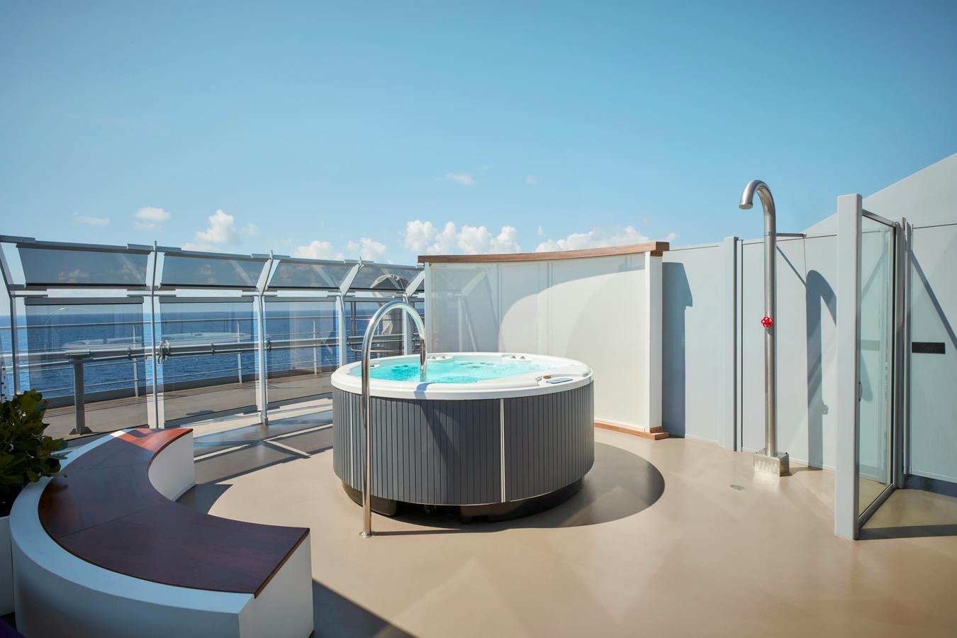 Official Virgin Voyages Massive Suite terrace hot tub and outdoor shower overlooking the sea