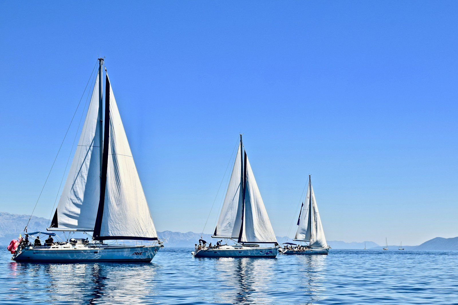 Windstar Wind Surf Flagship Five-Masted Sailing Yacht Under Full Sail at Sea